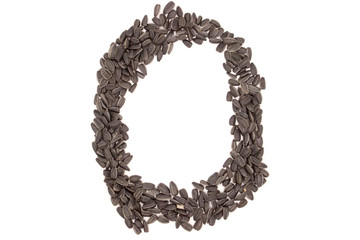 Obraz premium Alphabet from black sunflower seeds isolated on white background