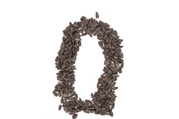 Numerals from black sunflower seeds isolated on white background.
