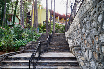 Fototapeta na wymiar Stone steps in the Park on a summer day