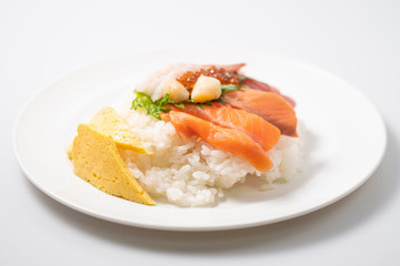 Salmon sashimi, Ikura(salmon roe) and other seafood with rice, Japanese style food.