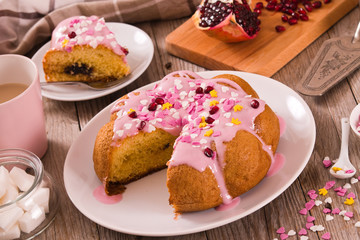 Cake with pink frosting.