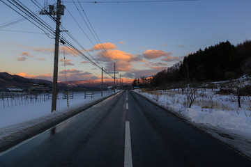 Beautiful Winter Landscape with Winter forest under the snow , powder snow on a road in, Hokkaido Japan