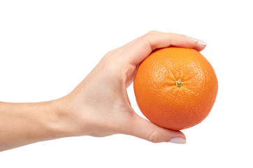 Hand with fresh orange tangerine, raw citrus fruit