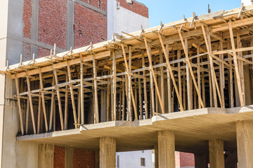 Construction of the new modern residential building, wooden framework. Hurghada, Egypt