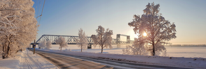 Arkhangelsk. Sunny winter day. January. Railway bridge