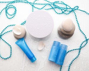 Cosmetic bottle containers with water drop, Blank label for branding mock-up, Natural beauty product concept.