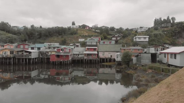 Palafito houses above the water in Castro, Chiloe, Chile. 4k