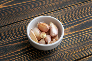Garlic cloves in a Cup.