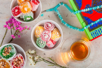 various pieces of turkish delight lokum and black tea
