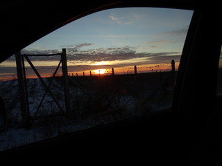 Dramatic Sunrise Sky View through Car Window