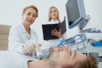 Obraz premium Man, doctor and nurse on medical examination.