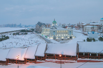 Fototapeta na wymiar Northeast wall of Kremlin and Palace of farmers. Kazan, Russia