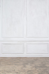 Empty interior with white wall panels