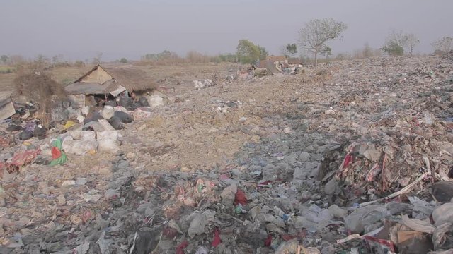 Illegal migrant worker in rubbish dump site in Mae Sot, Thailand.