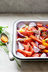 Mixed onions and tomatoes in a tray