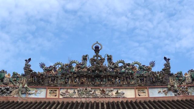 Ba Thien Hau Pagoda with ceramic figures, called smiling sculpture, because of their cheerfull, happy faces, Ho Chi Minh, Vietnam