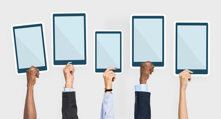 Hands holding digital tablets clipart