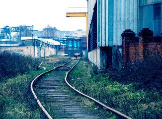 railway in the industrial zone..empty rails with a semaphore, in anticipation of a freight train.