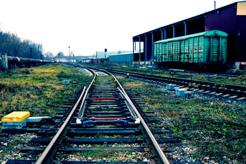 railway in the industrial zone..empty rails with a semaphore, in anticipation of a freight train.