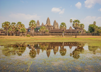 Fototapeta na wymiar Angkor Wat, Cambodia - one the largest religious monument in the world, and the most famous landmark of the country