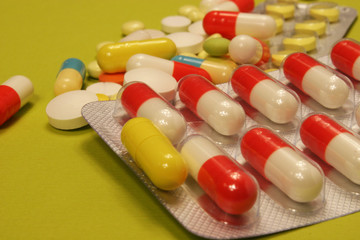 tea bags on green background.