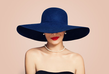 Beautiful smiling woman in elegant hat on pink background. Stylish girl with red lips makeup, fashion portrait - obrazy, fototapety, plakaty