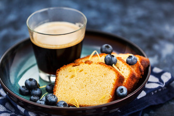 Lemon pound cake slices and cup of coffee
