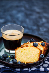 Lemon pound cake slices and cup of coffee