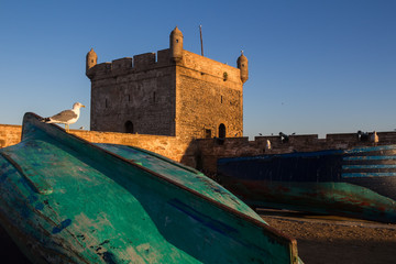 Fishing boats and a fortification tower