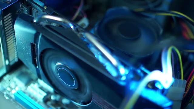 PC components in dust. The video card inside the computer does not work, the fan is dusty.