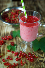 Cocktail or milk drink yogurt from red currant is poured into a glass bowl