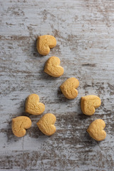 Heart shaped cookies on light rustic background