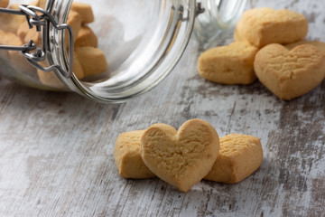 Heart shaped cookies on light rustic background