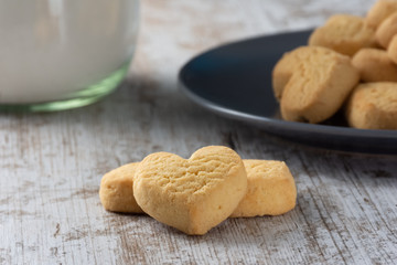 Heart shaped cookies on light rustic background