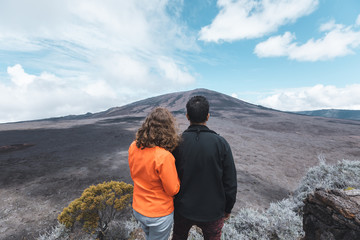 Couple watching the Piton de la Fournaise in Reunion Island