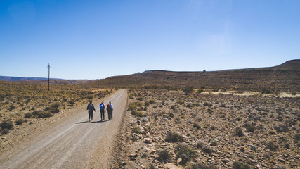 Aerial image of a group of hikers doing a hiking train in the karoo region of south africa