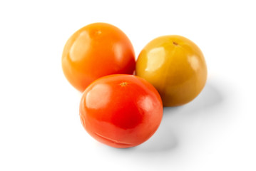 Pickled tomatoes isolated on white background.