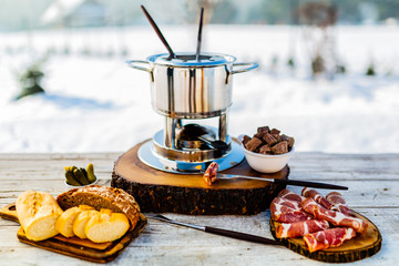 Meat fondue, traditional Swiss dish.
