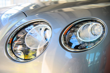 Closeup of elegant headlights car