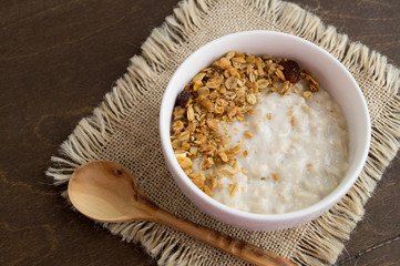 Healthy Breakfast. Oatmeal in a white bowl
