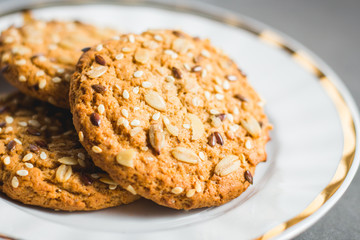 Oatmeal cookies in a white plate close up