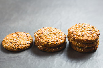 Delicious cookies by the row on a neutral background