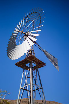 Close up image of a windpump / windpomp / in the great karoo region of south africa