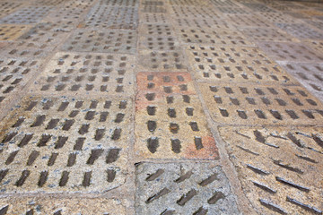 Fototapeta premium Old wet paving slabs after the rain