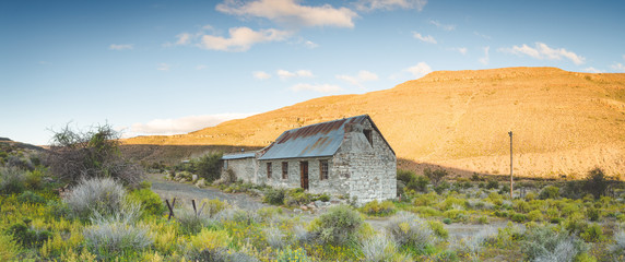 Wide angle view of an old abandoned building in the karoo region of south africa
