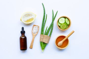 Natural ingredients for homemade skin care on white.