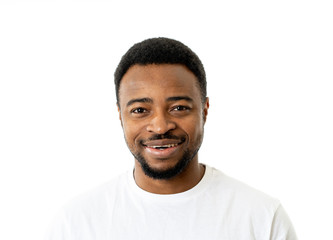 Close up portrait of smiling and laughing attractive man in happy face human emotion and expression