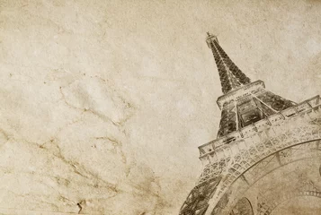 Foto op Canvas Old vintage paper texture background with the silhouette of the eiffel tower in Paris. High-quality photo texture of old vintage paper with scuffs, cracks and drops of spilled coffee. © HappyRichStudio