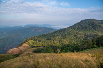 Landscape mountain valley nature forest with camping tents of northern Thailand.