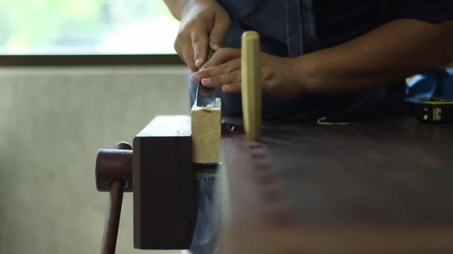 Carpenter examines the flatness with eyes